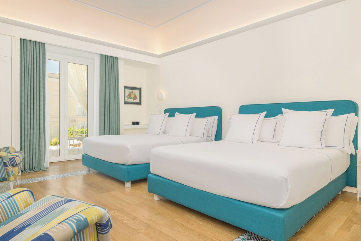Junior suite, 1 slaapkamer | Luxe beddengoed, bedden met traagschuimmatrassen, een minibar