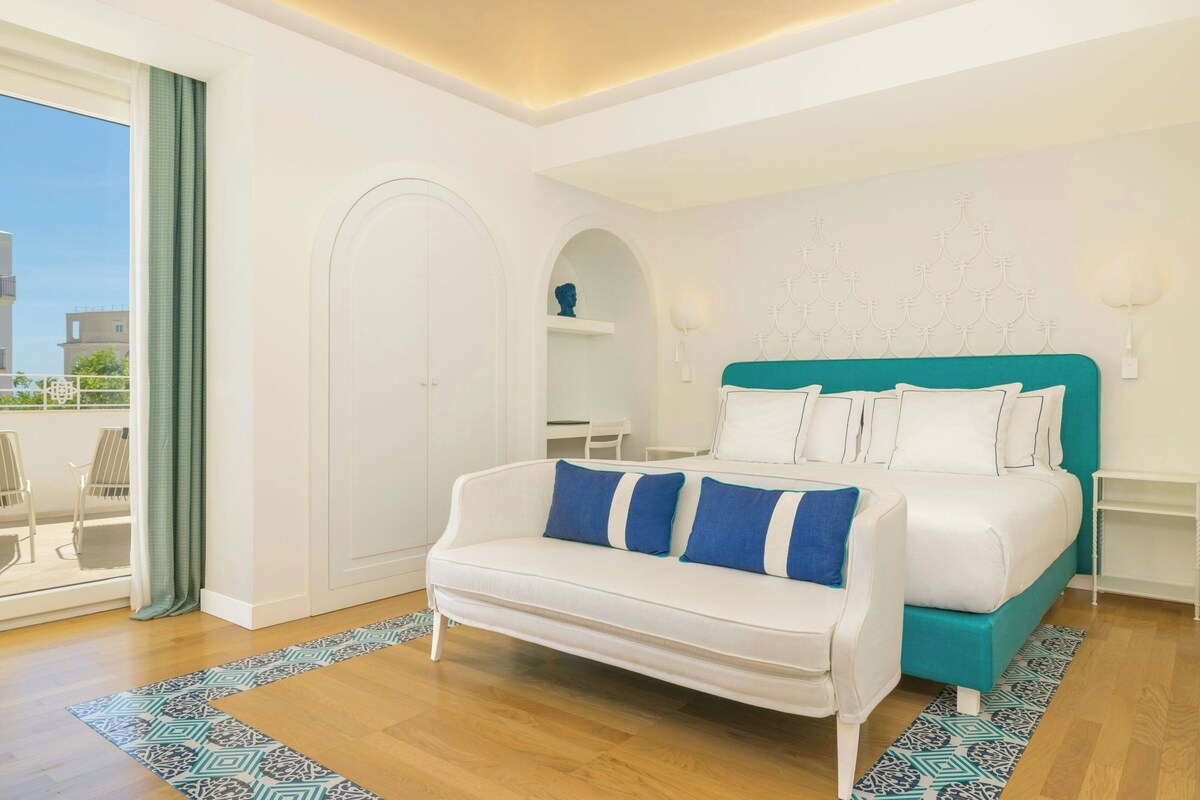 Junior suite, 1 kingsize bed, uitzicht op tuin | Luxe beddengoed, bedden met traagschuimmatrassen, een minibar