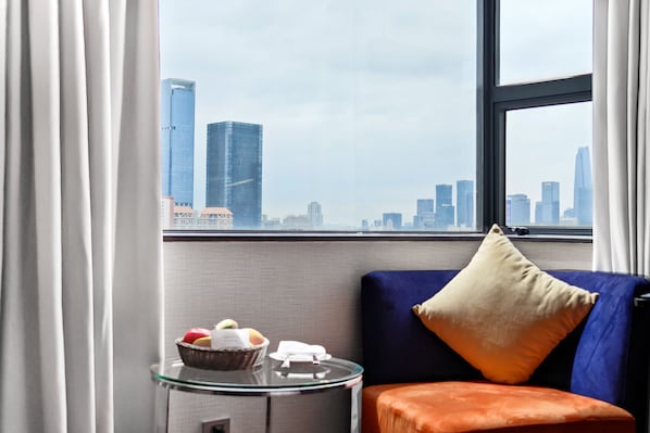 Premium bedding, down comforters, pillowtop beds, minibar