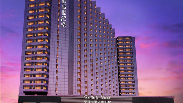 A high-rise hotel with multiple floors, a prominent entrance, and a clear sky in the background. - The Pavilion Century Tower Hotel (Shenzhen)