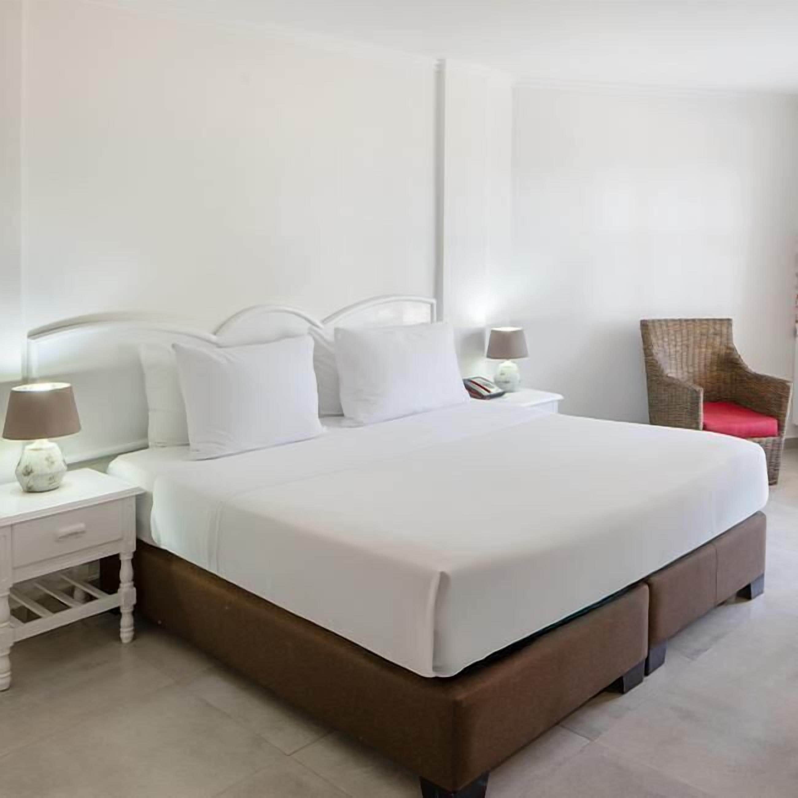 In-room safe, blackout curtains, bed sheets