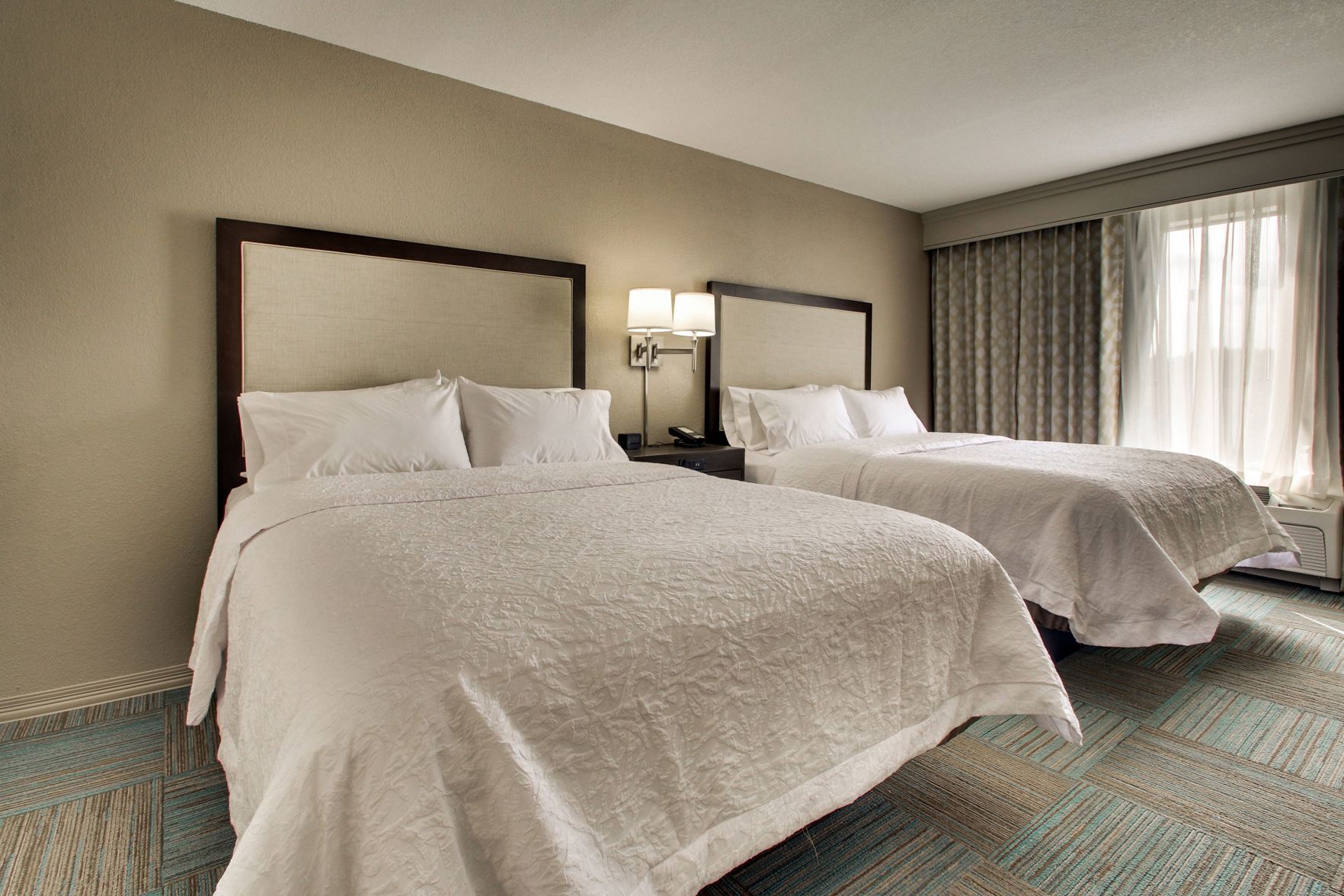 Premium bedding, down duvets, individually decorated