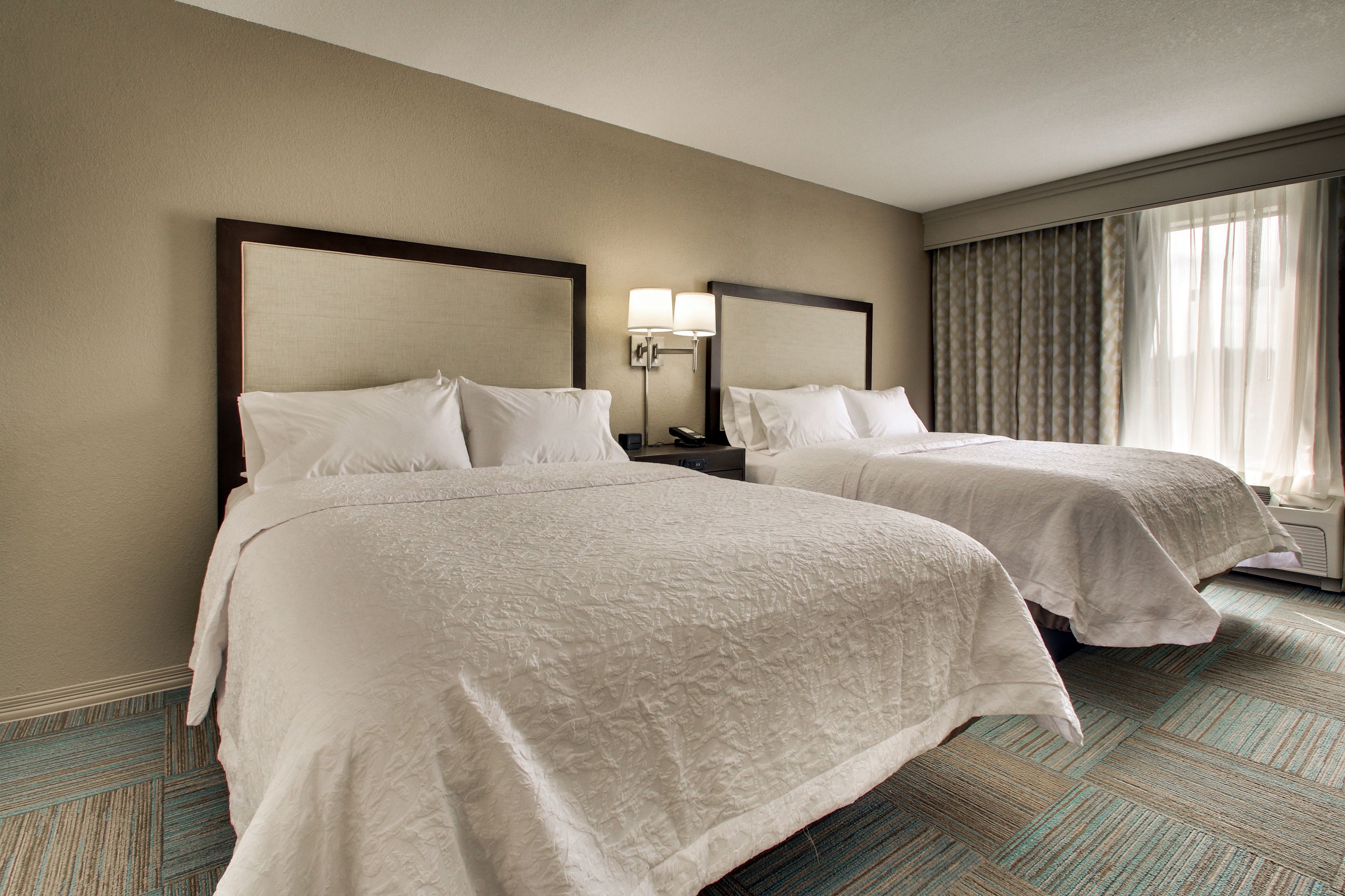 Premium bedding, down duvets, individually decorated