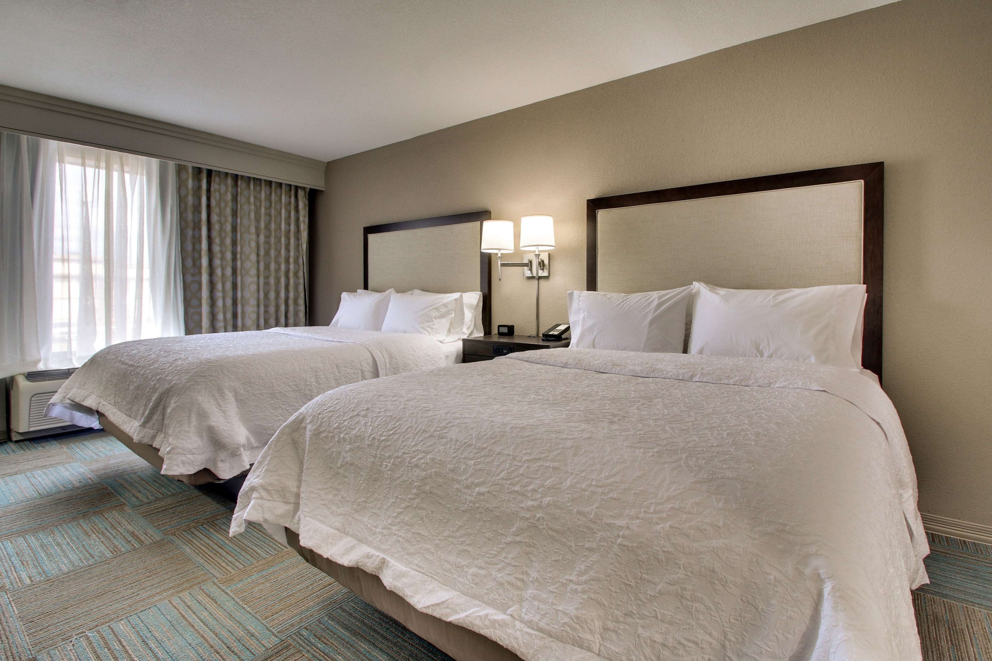 room, 2 queen beds, non smoking, refrigerator & microwave | premium bedding, down duvets, individually decorated