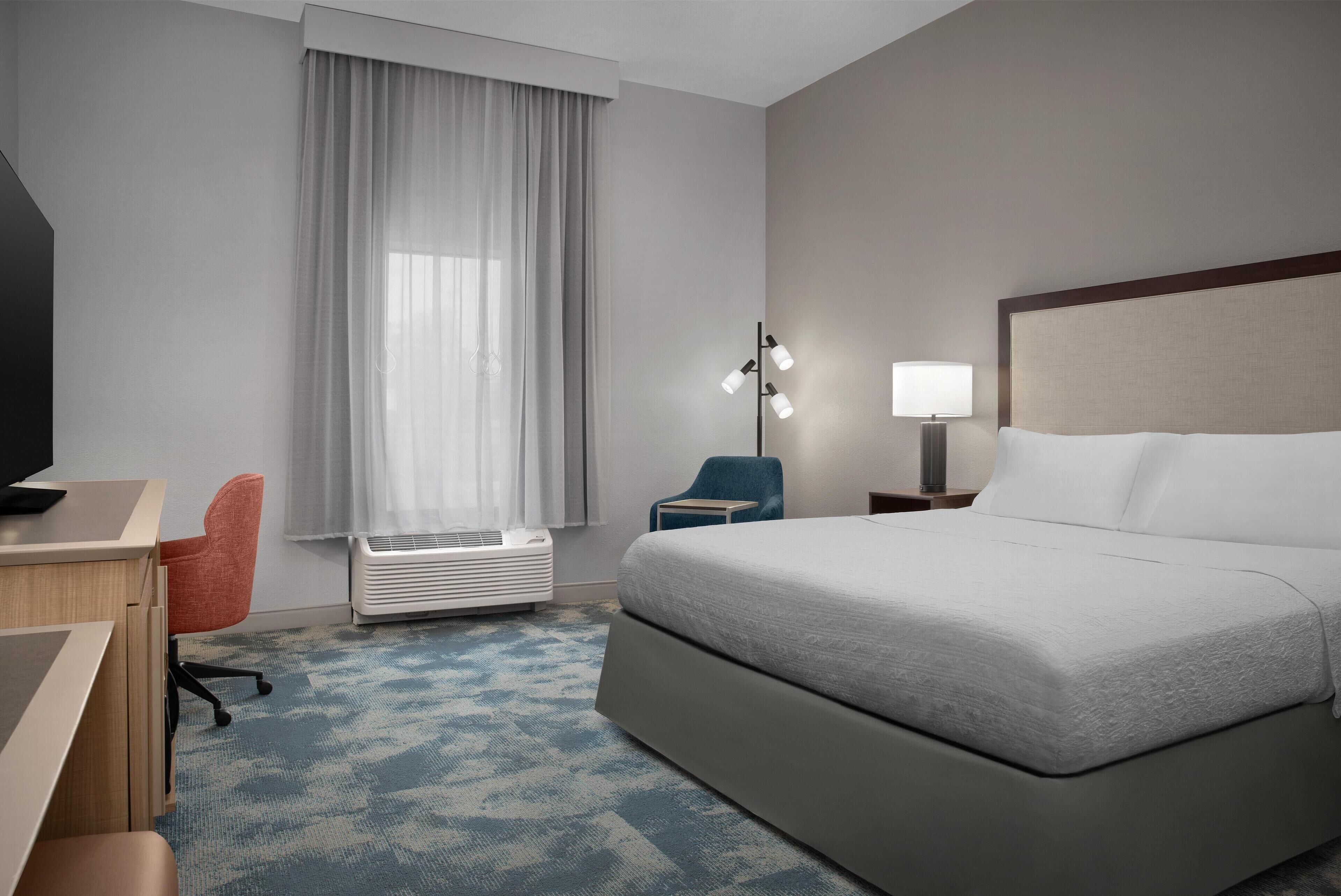 Premium bedding, down duvets, individually decorated