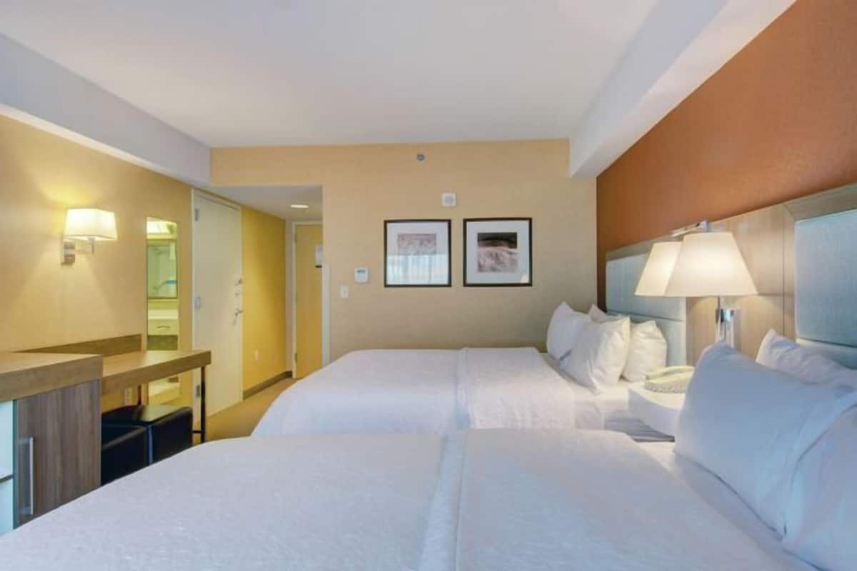 Blackout drapes, iron/ironing board, free cribs/infant beds