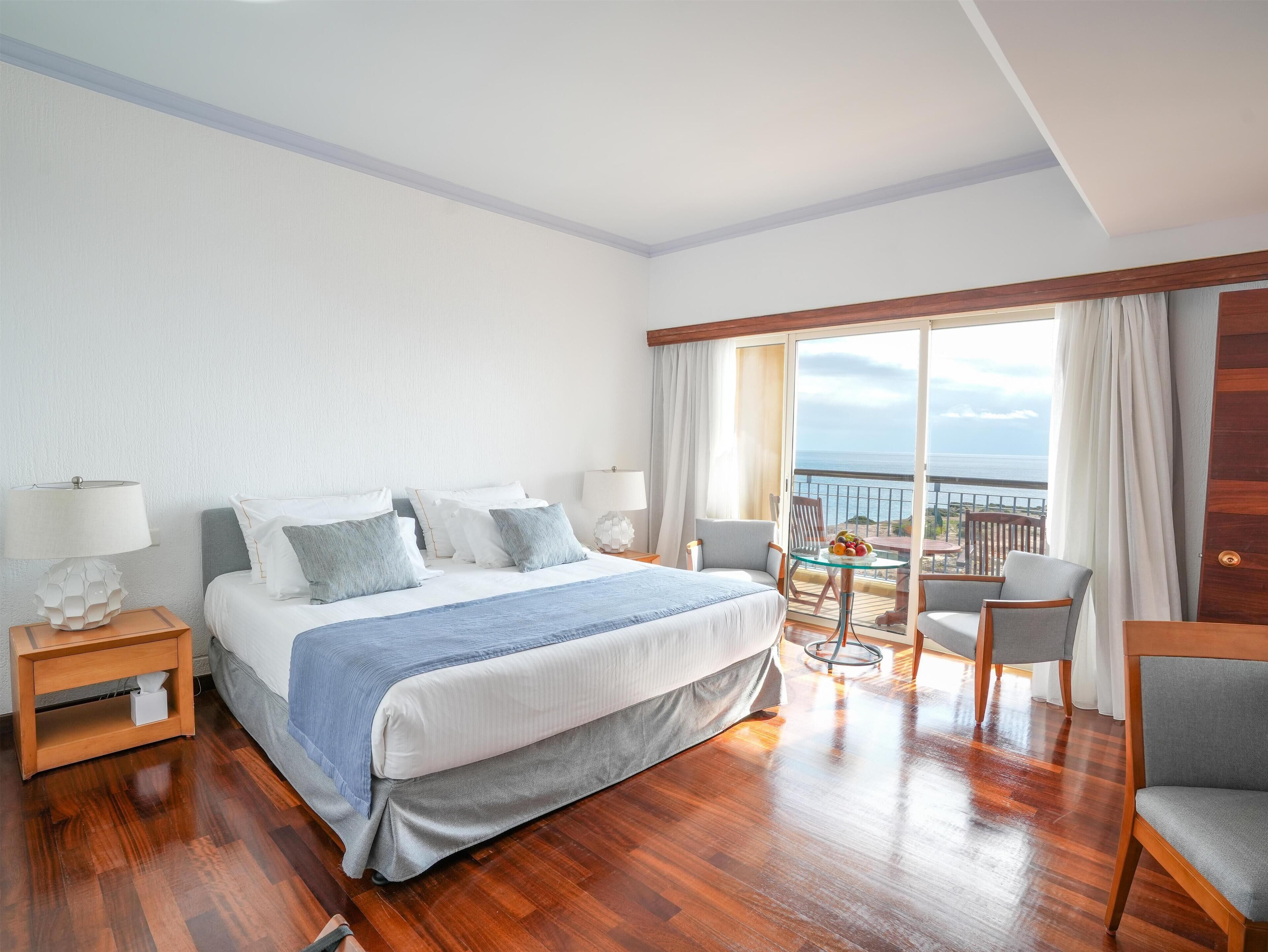 Executive Suite, 2 Bedrooms, Sea View | Minibar, in-room safe, desk, blackout drapes