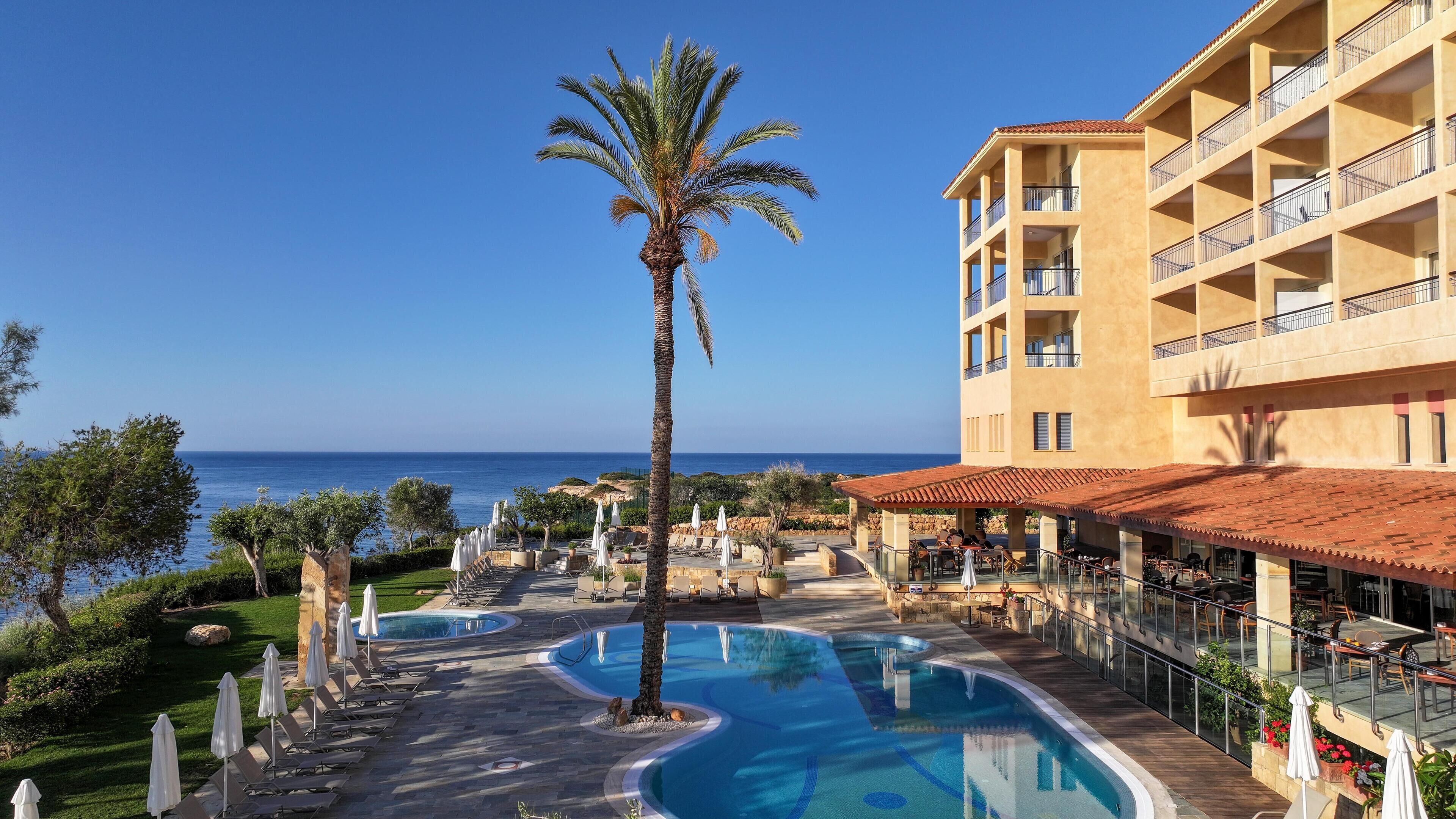 Indoor pool, outdoor pool, open 8:30 AM to 7:30 PM, pool umbrellas