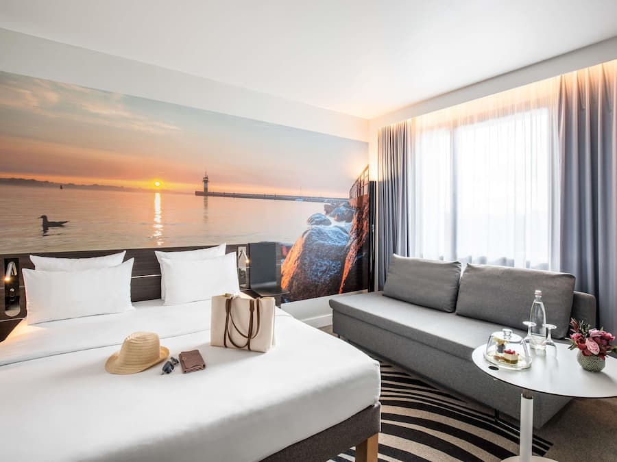 In-room safe, laptop workspace, blackout drapes, soundproofing