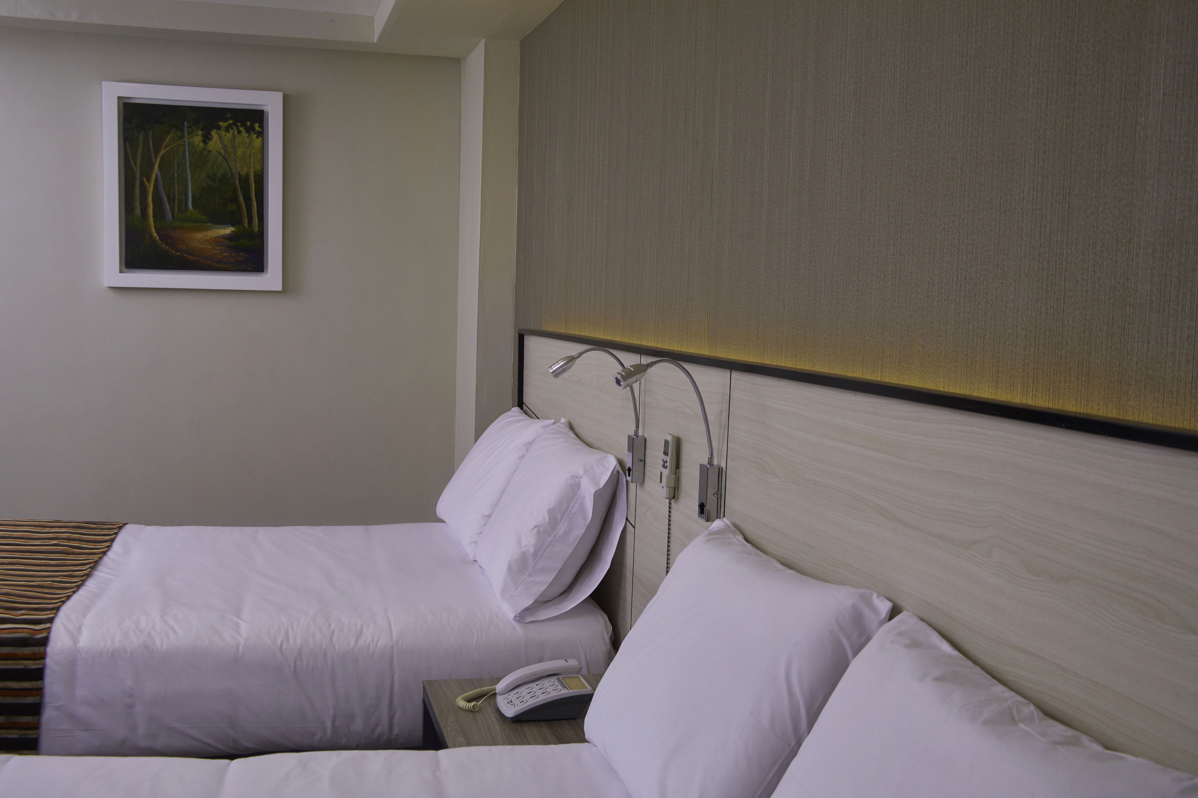 triple room | minibar, in-room safe, desk, blackout curtains