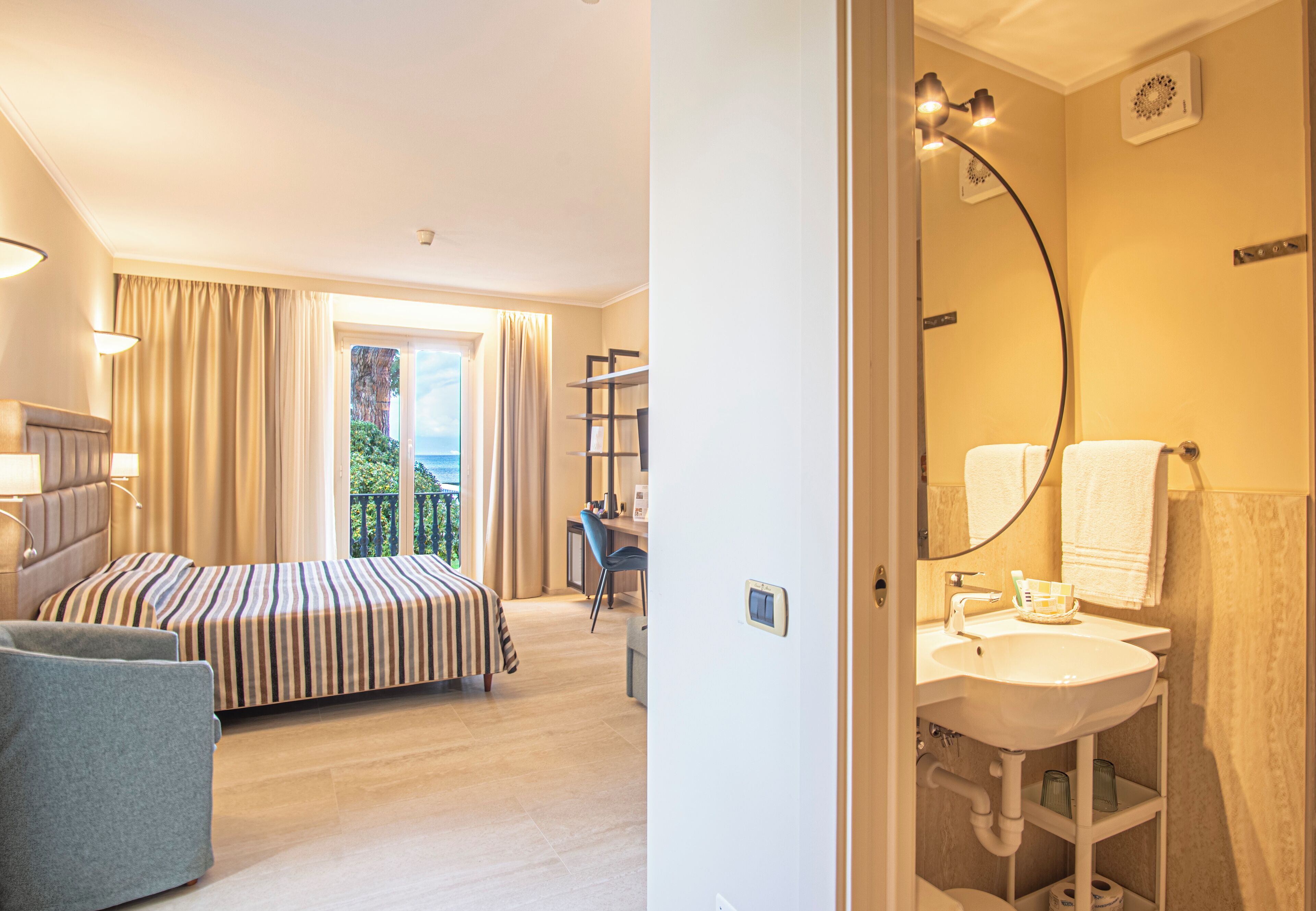 junior studio suite, sea view | 1 bedroom, down duvets, minibar, in-room safe