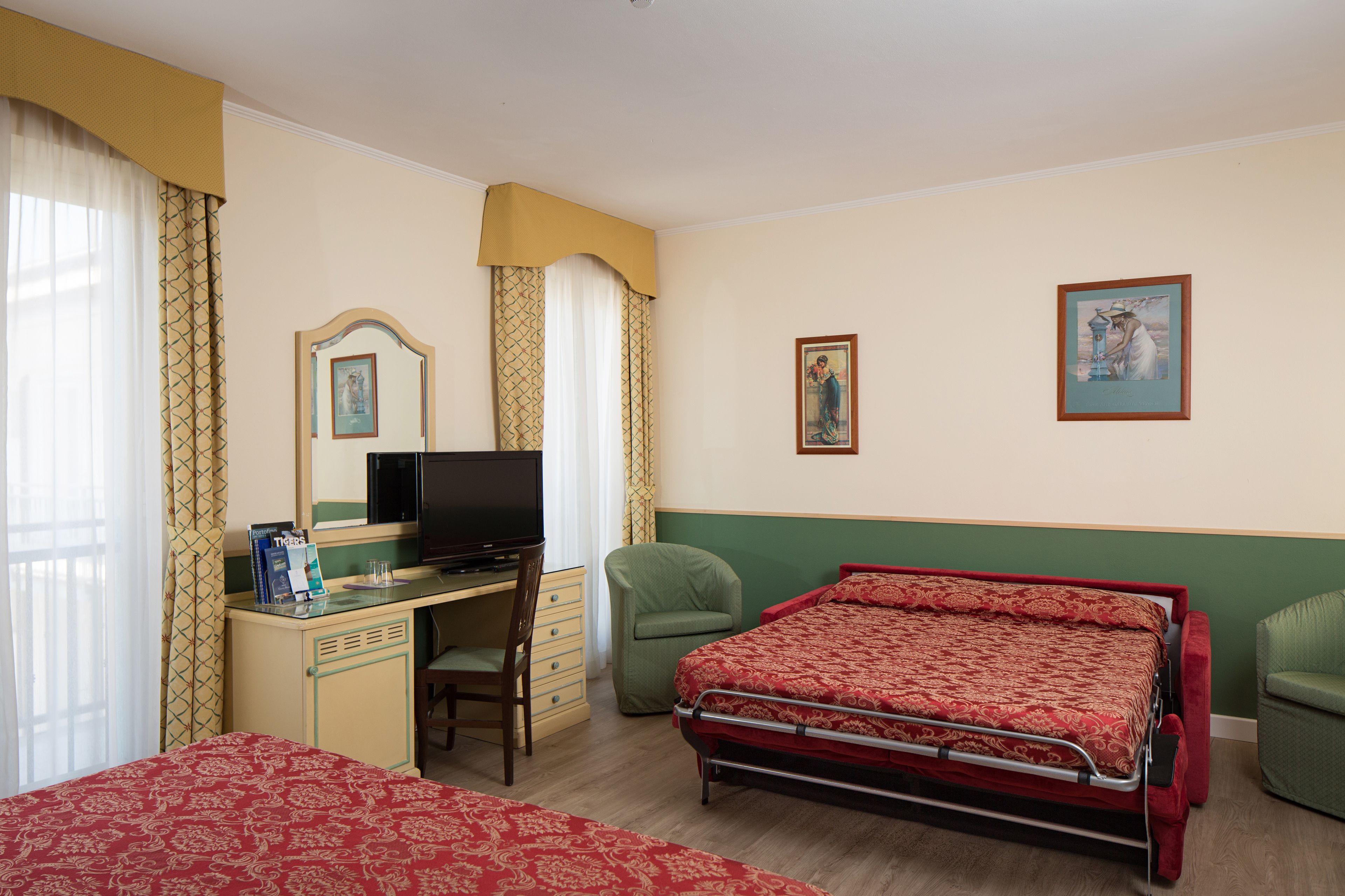 Family Quadruple Room | 1 bedroom, down comforters, minibar, in-room safe