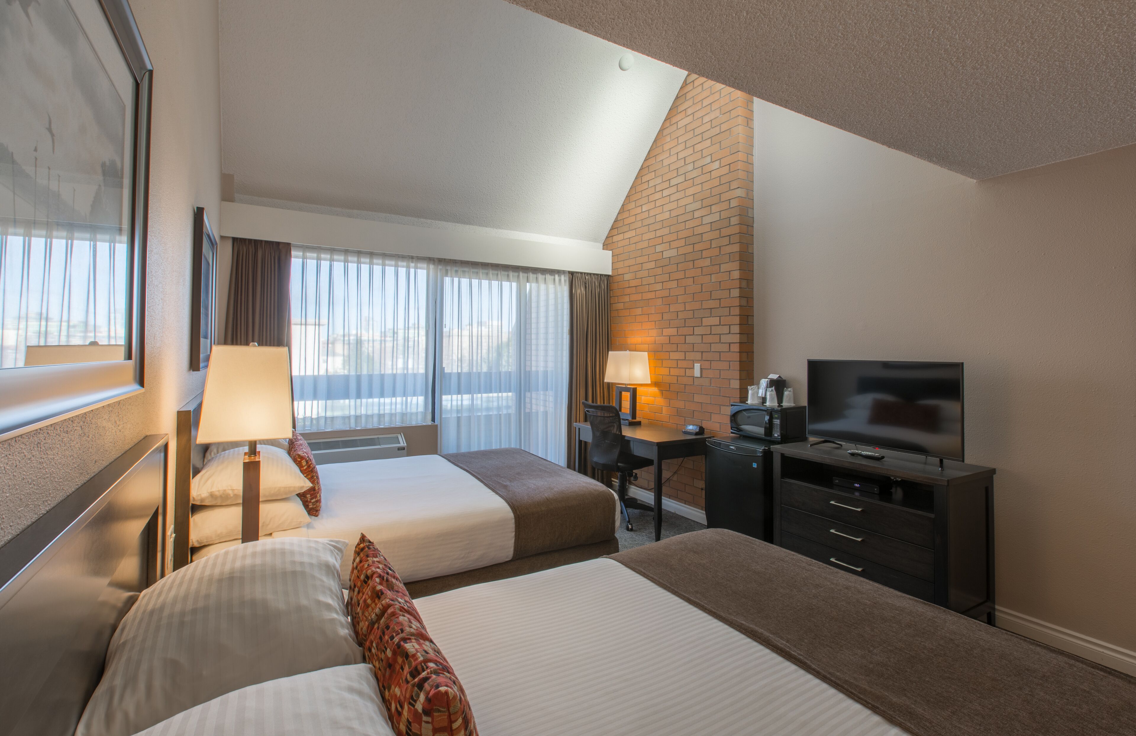 standard room, 2 queen beds | in-room safe, desk, blackout curtains, iron/ironing board