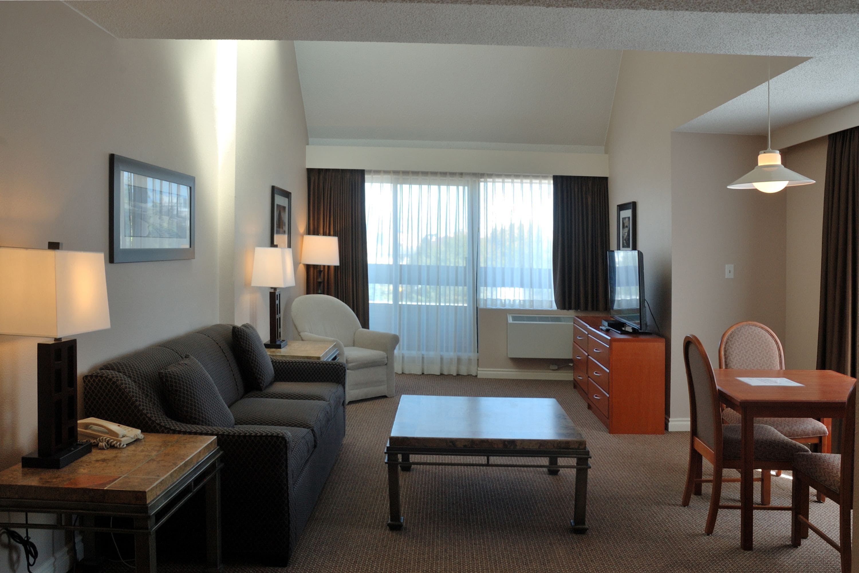 family suite, 2 queen beds | in-room safe, desk, blackout curtains, iron/ironing board
