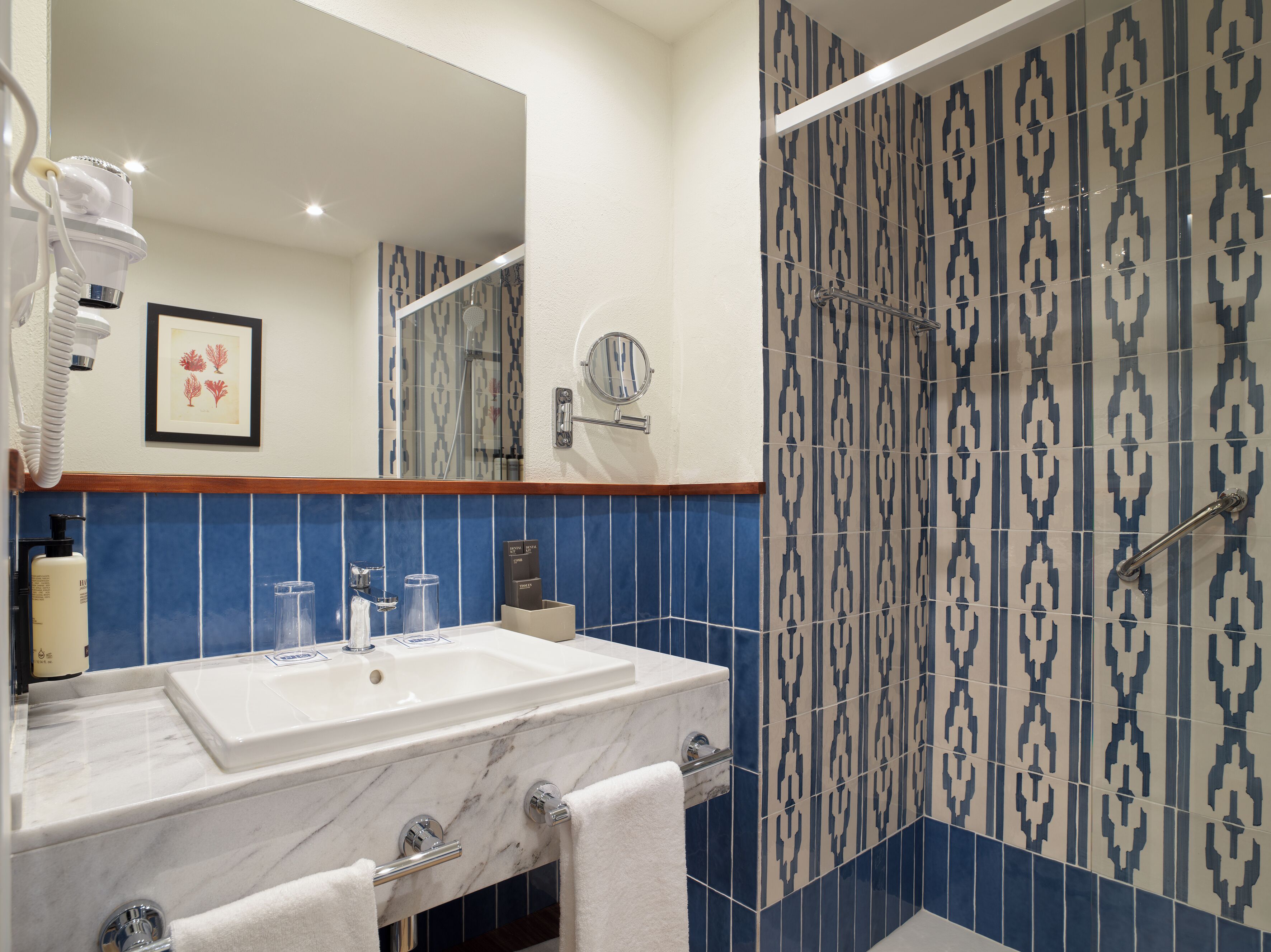 eco-friendly toiletries, hair dryer, towels