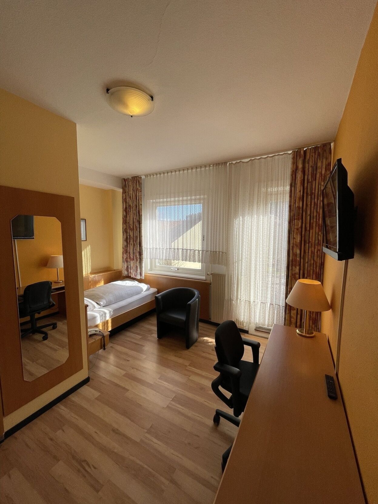 Pillow-top beds, individually furnished, desk, free WiFi