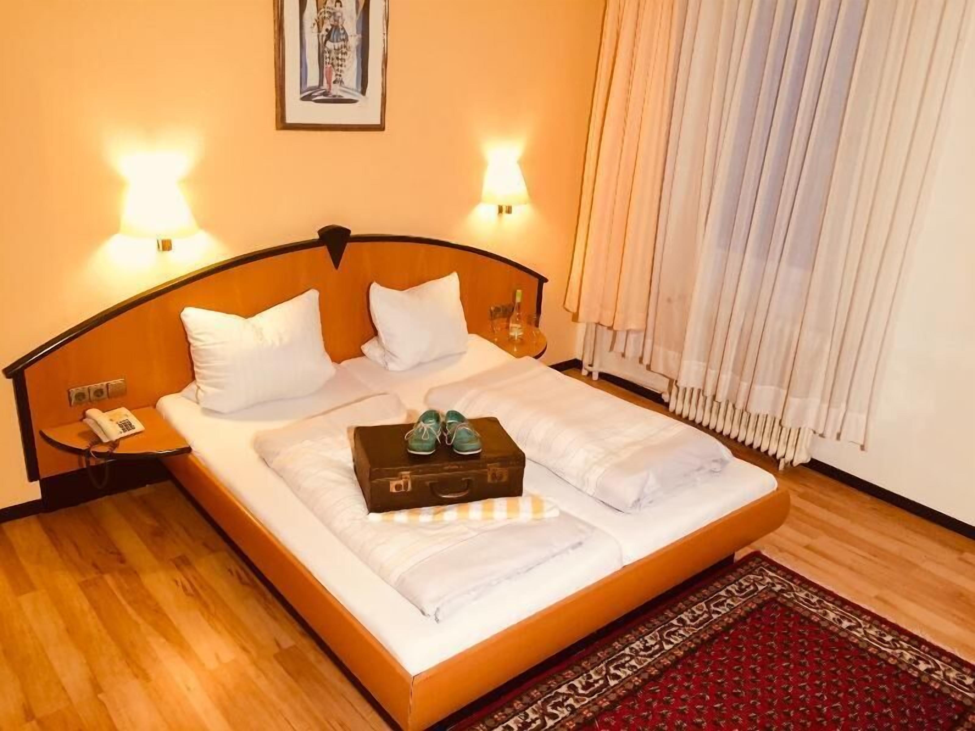 Pillow-top beds, individually furnished, desk, free WiFi