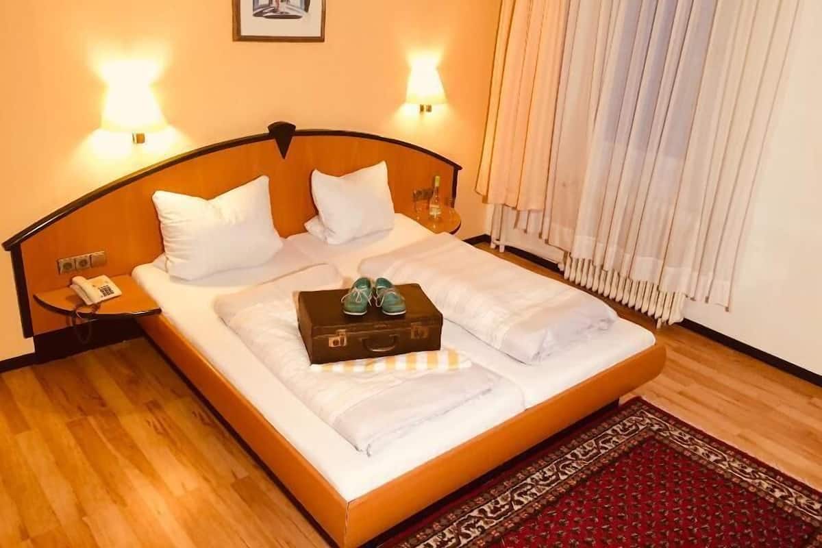 Pillow-top beds, individually furnished, desk, free WiFi