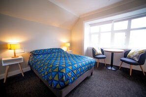 Quarto casal, banheiro compartilhado | 1 quarto, Wi-Fi de cortesia, roupa de cama