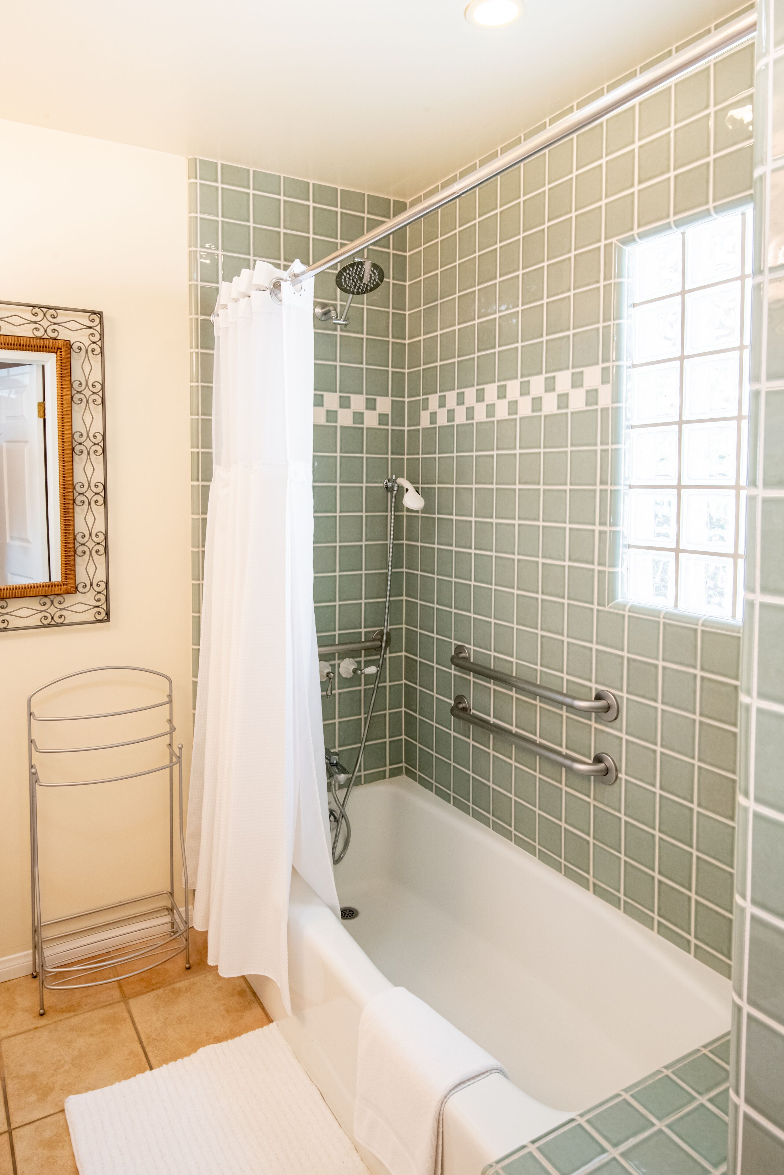 deluxe room, 1 queen bed | bathroom | designer toiletries, hair dryer, towels