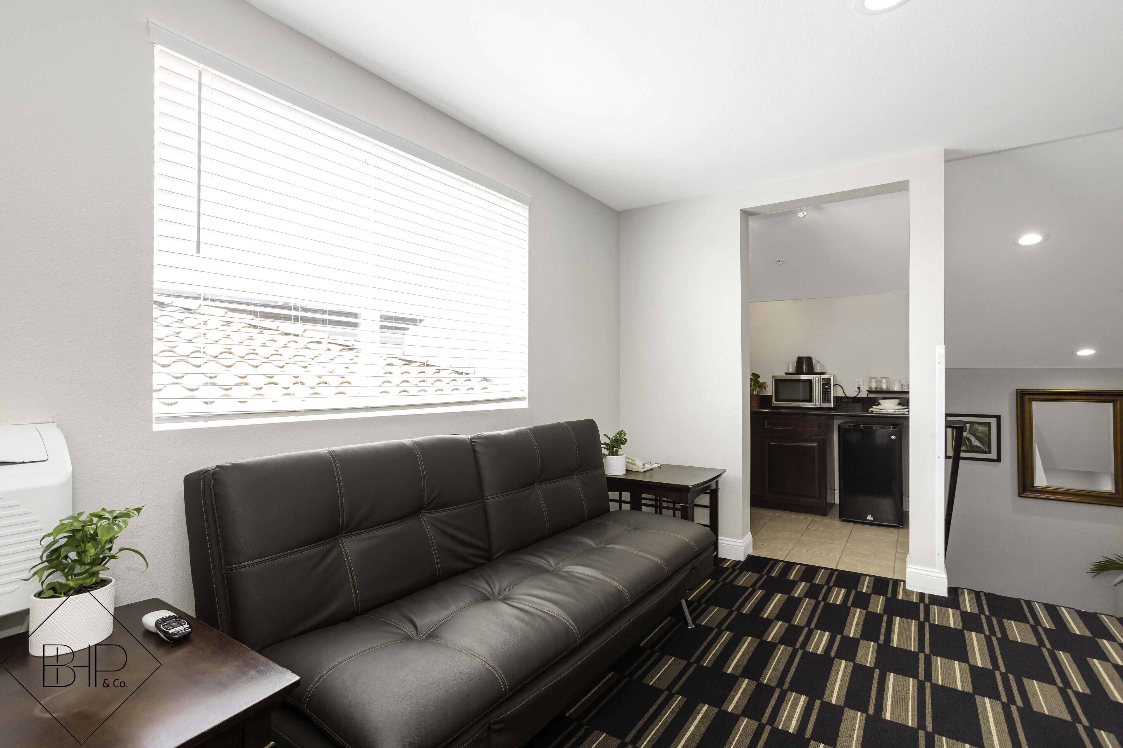 suite, 1 king bed with sofa bed | pillow-top beds, desk, blackout curtains, iron/ironing board