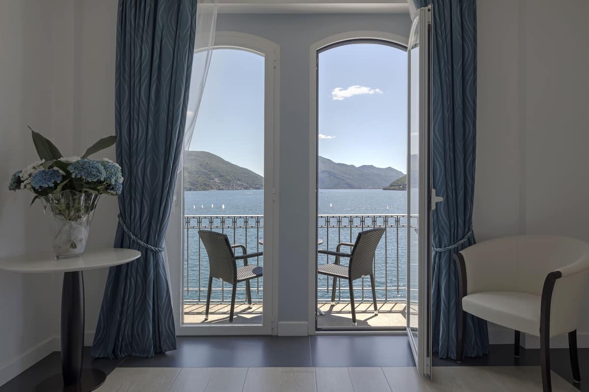 double room, balcony, lake view | 1 bedroom, minibar, in-room safe, desk