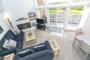 Televisión de 40 pulgadas con canales por cable, chimenea y Netflix 