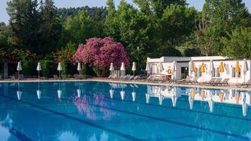 Indoor pool, outdoor pool, pool umbrellas