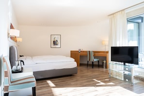 Suite familiar | Roba de llit d'alta qualitat, minibar i caixa forta a l'habitació