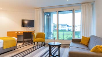 Familie suite | Luxe beddengoed, een minibar, een kluis op de kamer, een bureau