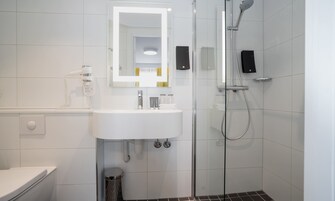 Shower, free toiletries, hair dryer, towels