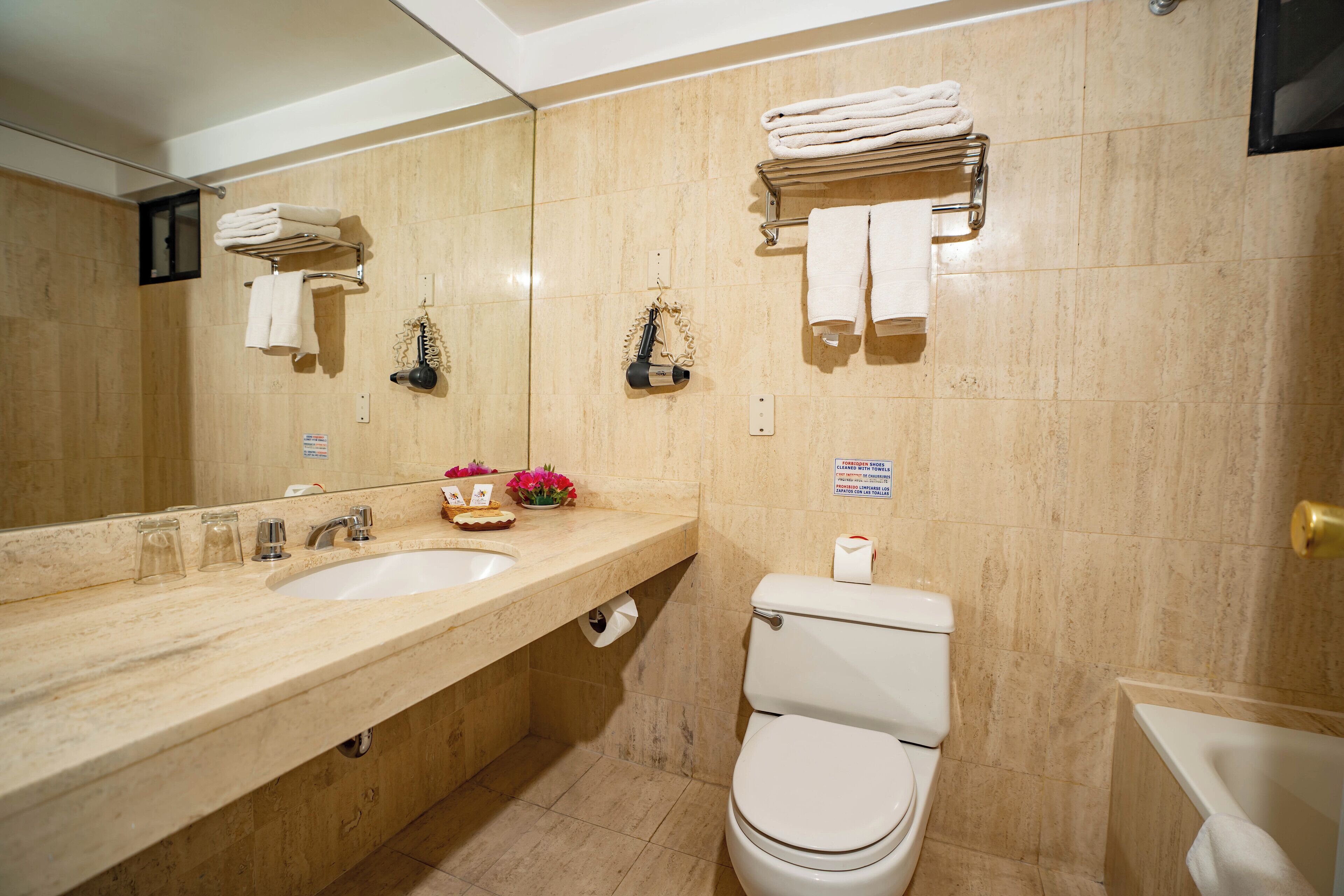 deep-soaking bathtub, free toiletries, hair dryer, towels