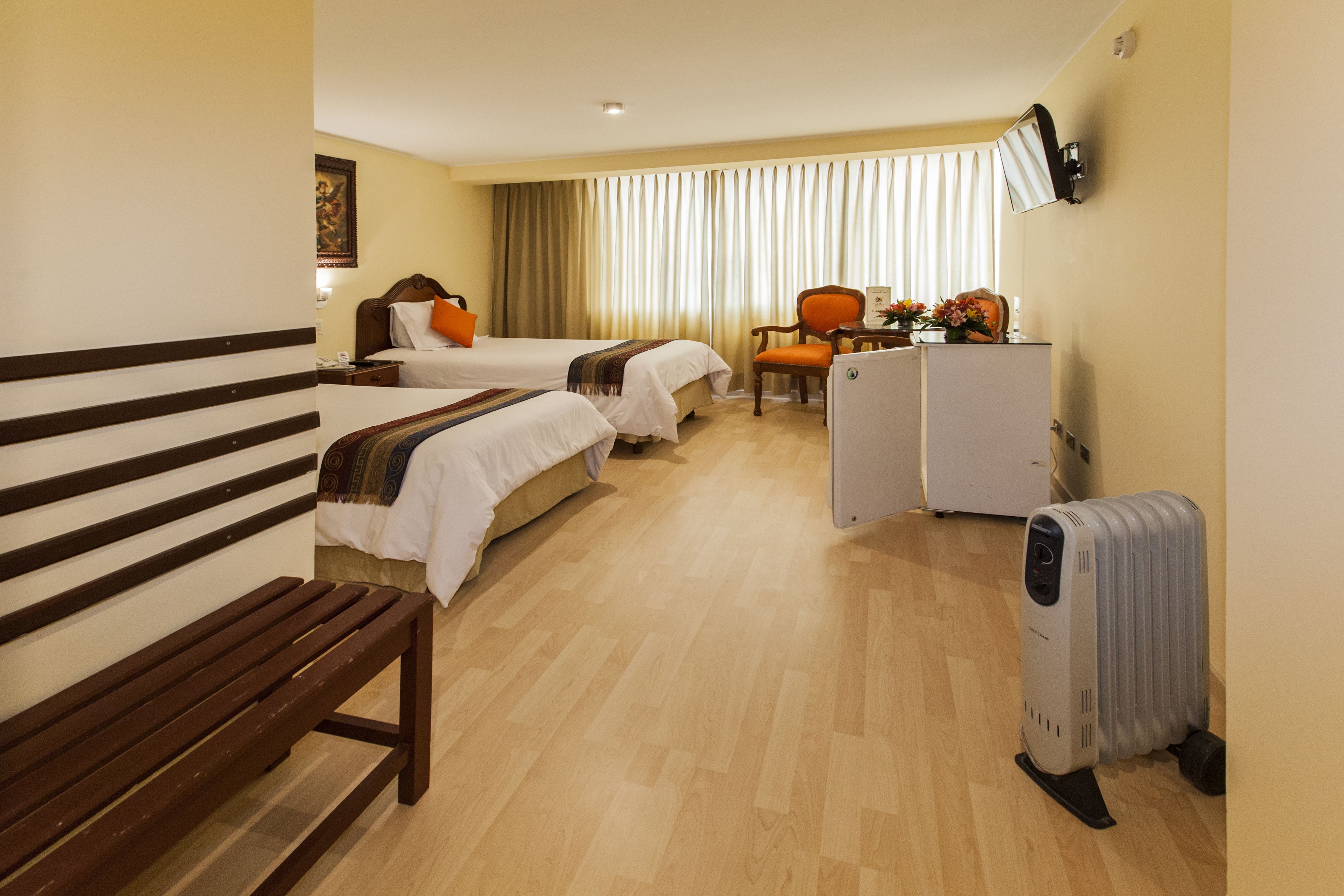 twin room | minibar, in-room safe, desk, blackout curtains