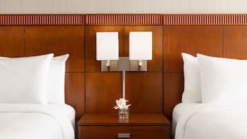 Down comforters, pillowtop beds, in-room safe, desk