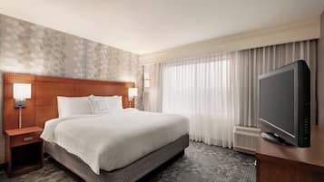 Suite, 1 King Bed with Sofa bed | Pillowtop beds, in-room safe, desk, blackout drapes