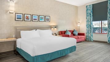 Room, 1 King Bed, Balcony | Living area | 42-inch flat-screen TV with cable channels, TV