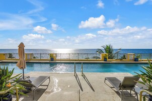 Outdoor pool, pool umbrellas, sun loungers