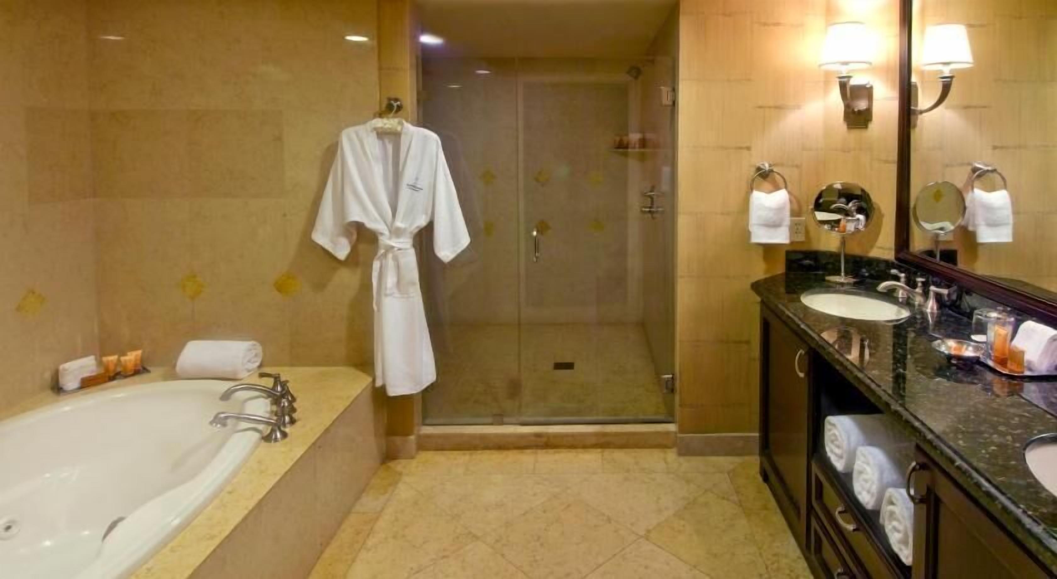 Bathroom | Designer toiletries, hair dryer, bathrobes, slippers