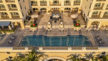 Outdoor pool, pool umbrellas, sun loungers