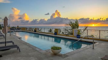 Outdoor pool, pool umbrellas, pool loungers