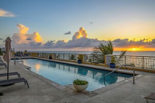 Outdoor pool, pool umbrellas, sun loungers