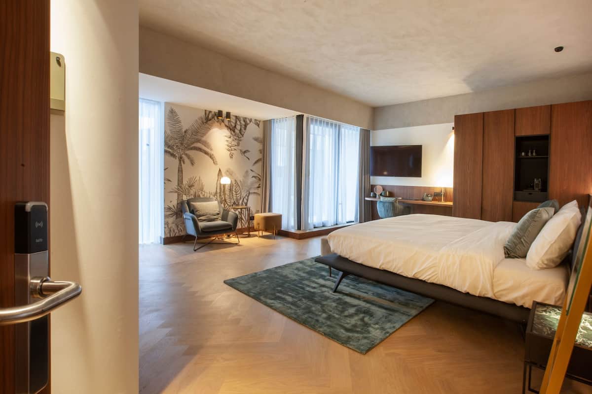 luxury double room, 1 bedroom, non smoking, city view | in-room safe, desk, laptop workspace, soundproofing