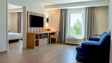 Suite, 1 Bedroom | Living area | 32-inch LED TV with cable channels, TV