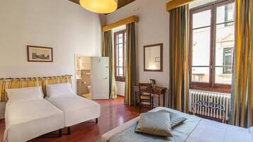 Quadruple Room | In-room safe, desk, laptop workspace, blackout curtains
