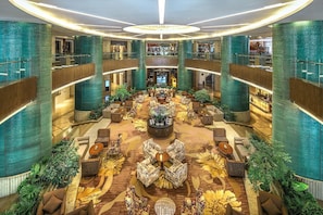 A spacious lobby with a central seating area, multiple levels, and a modern design. - Kempinski Hotel Chengdu (Chengdu)