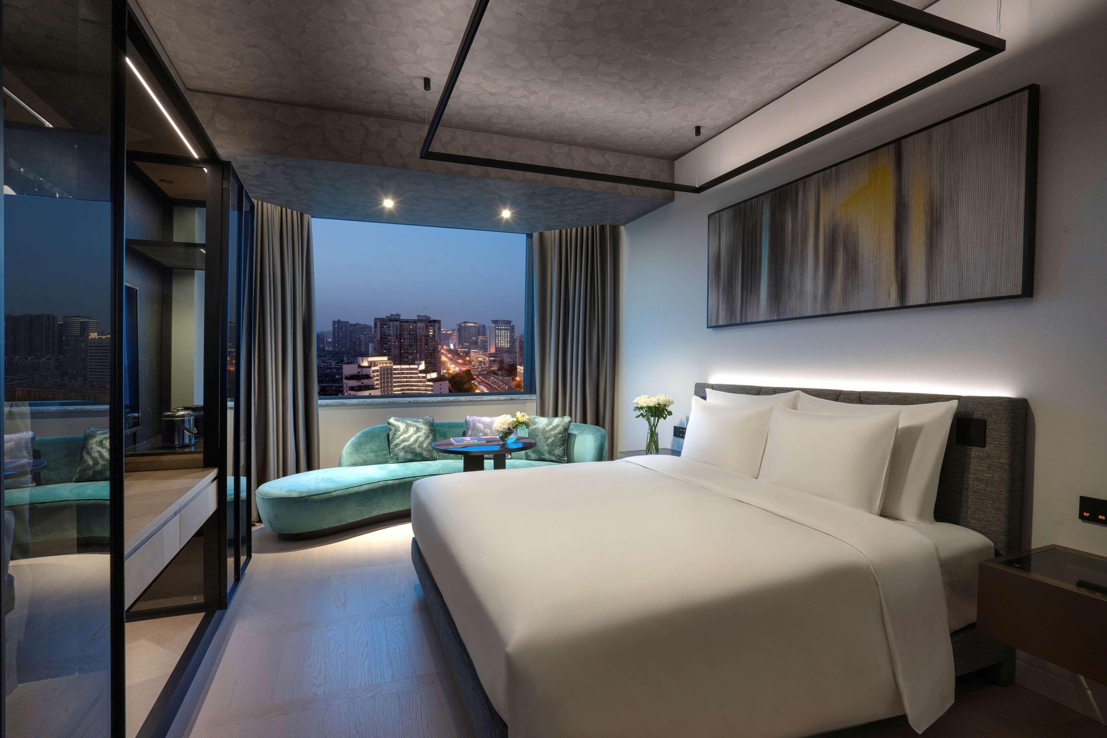 Premium bedding, down duvets, Select Comfort beds, minibar
