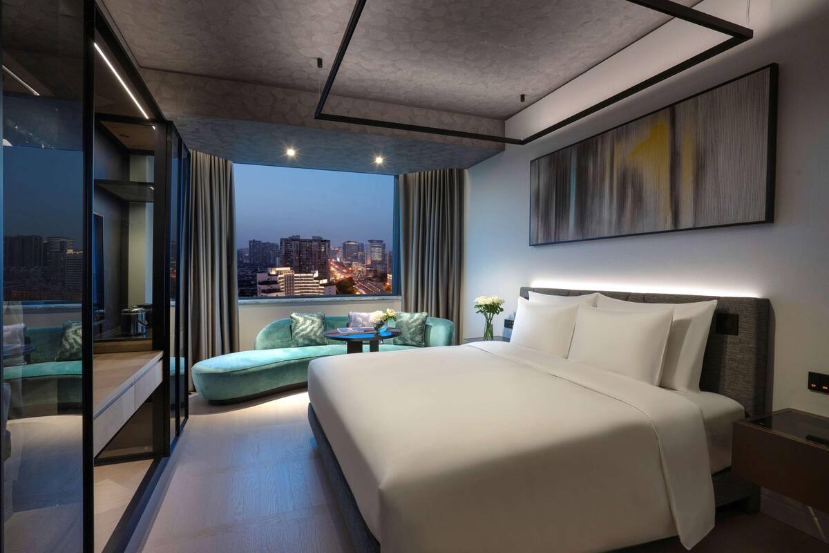 Premium bedding, down comforters, Select Comfort beds, minibar