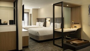 A hotel room with two beds, a desk, a chair, and a small table. - SpringHill Suites by Marriott Fort Worth University (Fort Worth)