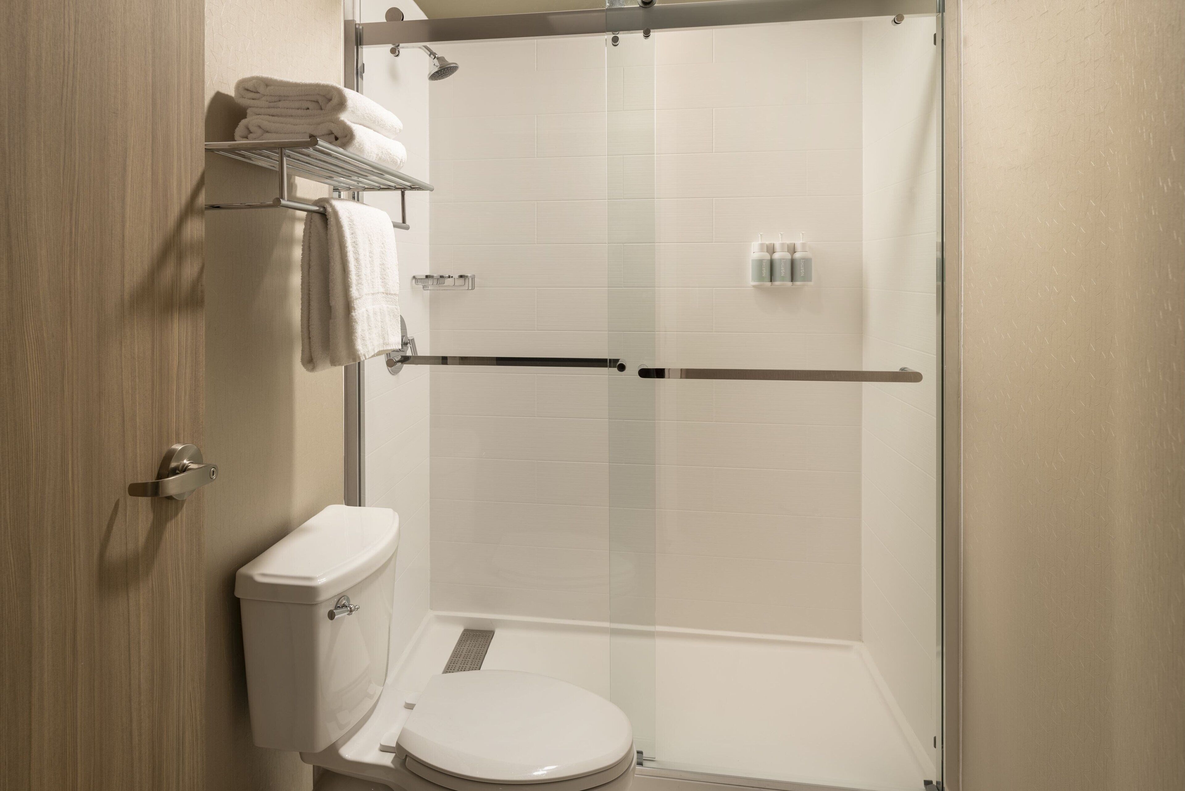 combined shower/bathtub, free toiletries, hair dryer, towels