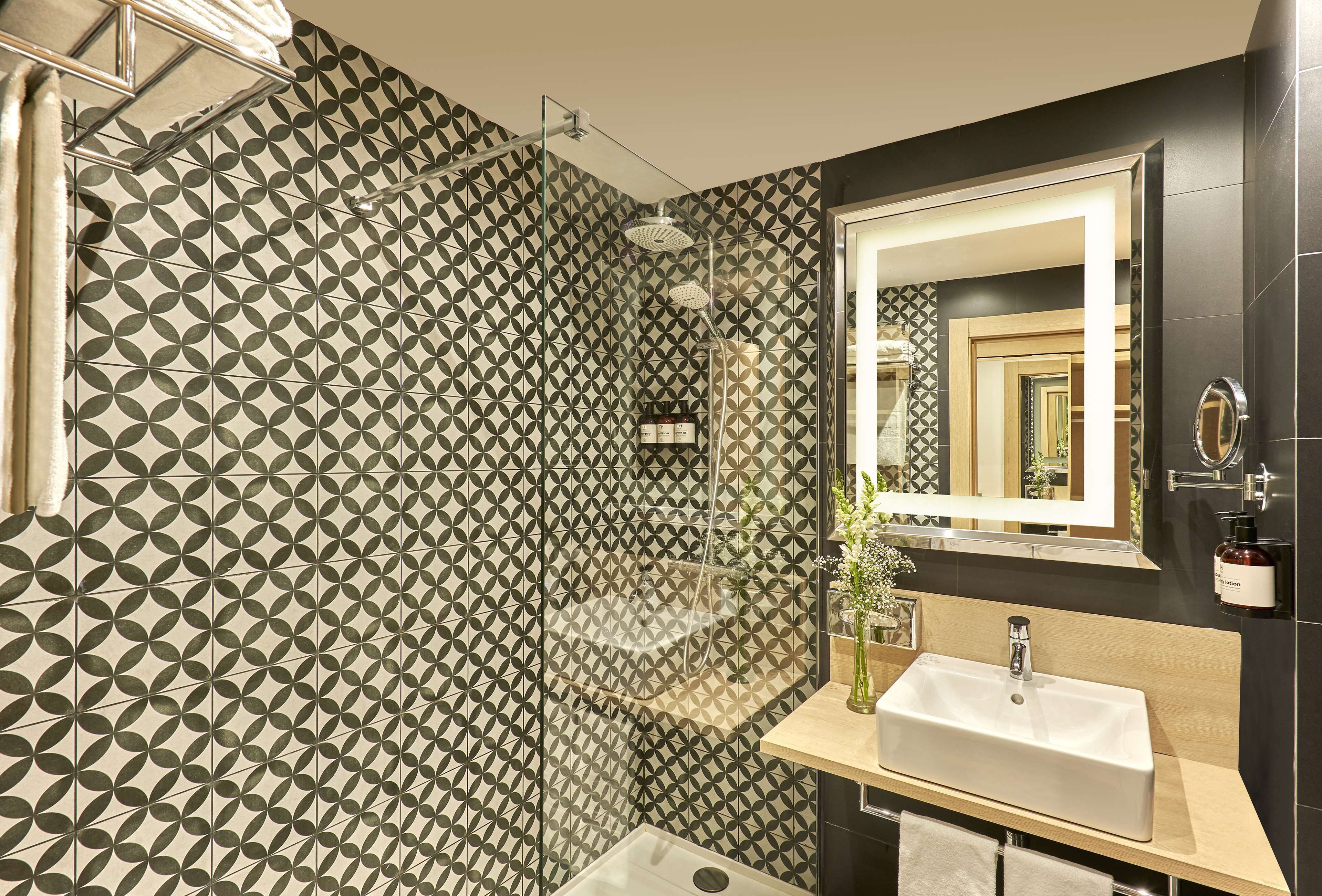 eco-friendly toiletries, hair dryer, towels